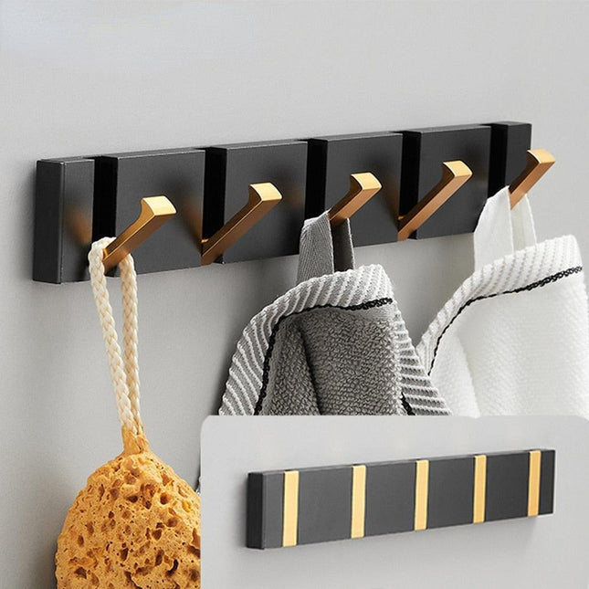 Elegant Black and Gold Foldable Wall Hook Rack for Stylish Storage Solutions