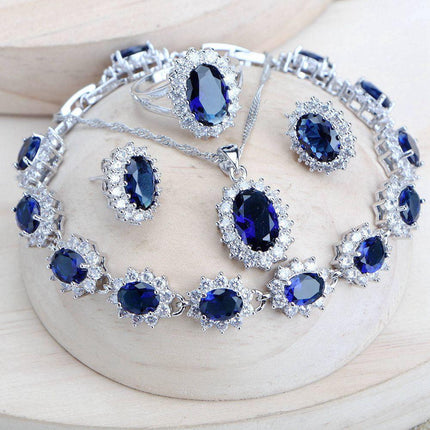 Elegant Blue Zirconia Sterling Silver Bridal Jewelry Ensemble.