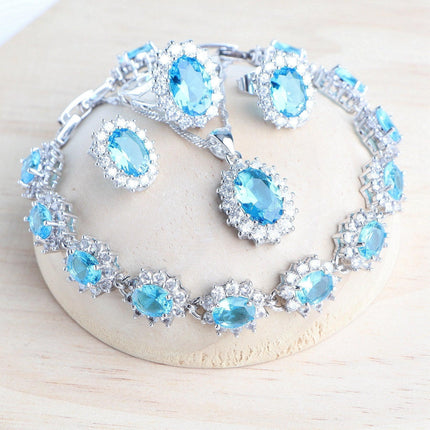 Elegant Blue Zirconia Sterling Silver Bridal Jewelry Ensemble.