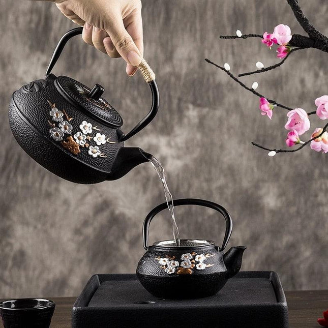 Elegant Japanese Cast Iron Tea Kettle Set with Plum and Bamboo Design - Complete Tea Serving Collection
