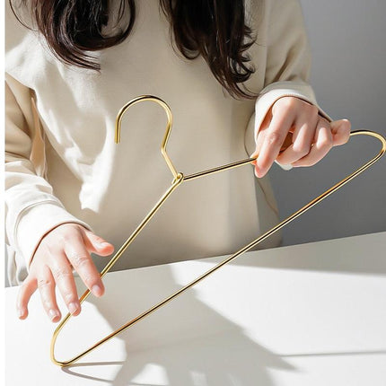Elegant Metal Hanger Collection - 10 Piece Set for Optimal Closet Management - Très Elite
