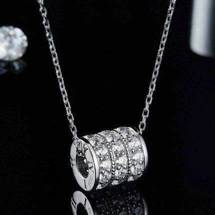 Elegant Moissanite Pendant Necklace with Platinum and Rose Gold Accents - Très Elite