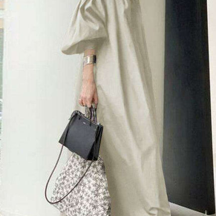 Elegant Solid Color Dress with Delightful Balloon Sleeves - A Trendy Choice for Contemporary Women