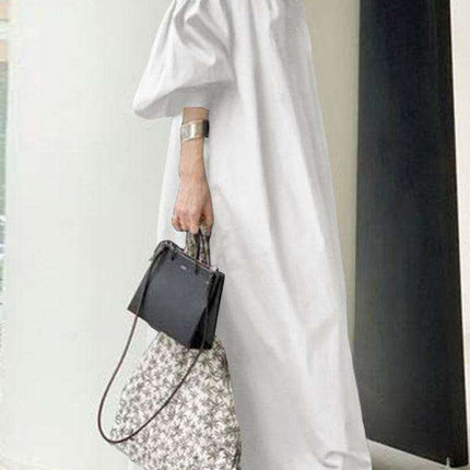 Elegant Solid Color Dress with Delightful Balloon Sleeves - A Trendy Choice for Contemporary Women