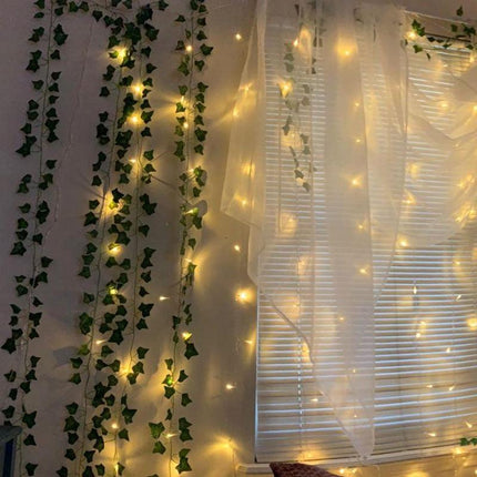 Ethereal Vine Wonderland: Premium Faux Rattan Garland with LED Illuminated Leaves - Très Elite