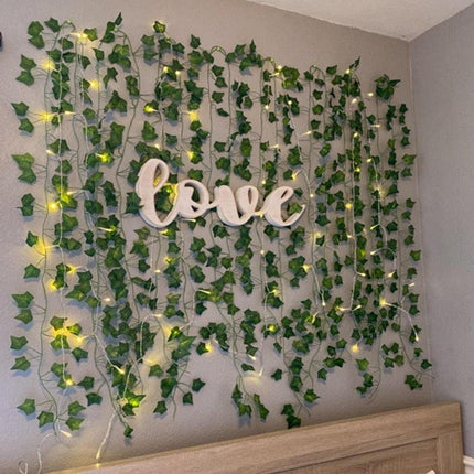 Ethereal Vine Wonderland: Premium Faux Rattan Garland with LED Illuminated Leaves - Très Elite
