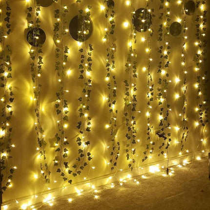 Ethereal Vine Wonderland: Premium Faux Rattan Garland with LED Illuminated Leaves - Très Elite