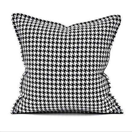 Elegant Black & White Grid Cushion Cover with Vibrant Orange Accent