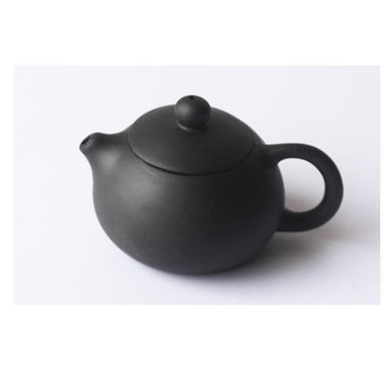 Whimsical Purple Clay Teapot Ensemble with Charming Tea Pet