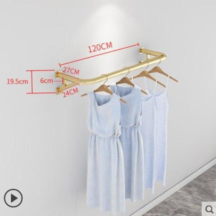 Elegant Wall-Mounted Clothing Rack for Stunning Women's Fashion Displays in Your Boutique