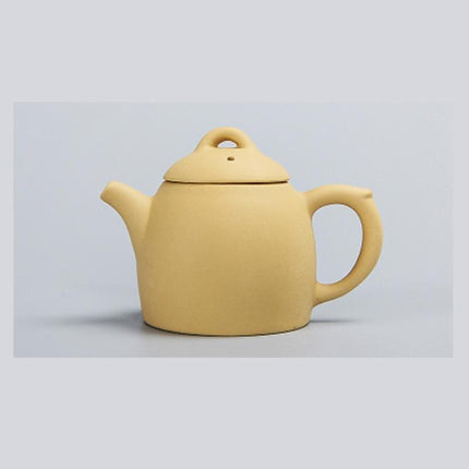 Whimsical Purple Clay Teapot Ensemble with Charming Tea Pet