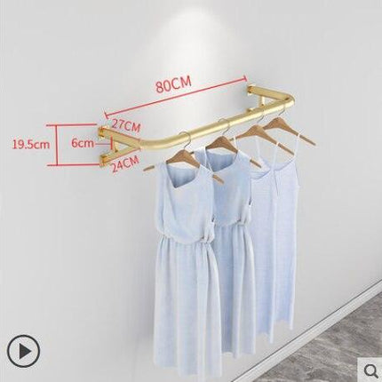 Elegant Wall-Mounted Clothing Rack for Stunning Women's Fashion Displays in Your Boutique