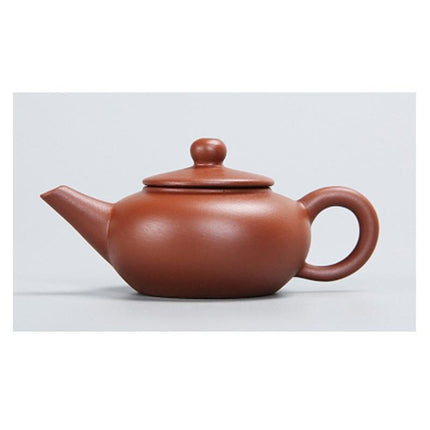 Whimsical Purple Clay Teapot Ensemble with Charming Tea Pet