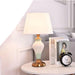 Elegant Metal Base Table Lamp with Soft Cloth Shade for Stylish Home Illumination