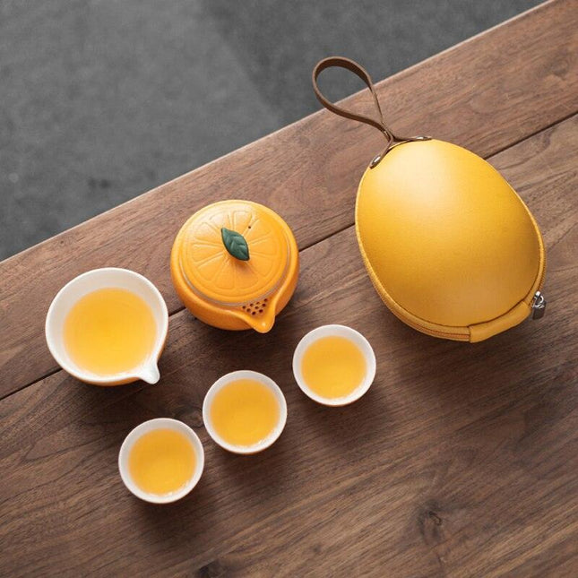 Elegant Orange Ceramic Travel Tea Set: Teapot, Cups, and Pitcher for On-the-Go Tea Lovers