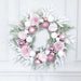 Elegant Christmas Wreath: Festive Door Decor for a Joyful Holiday Atmosphere