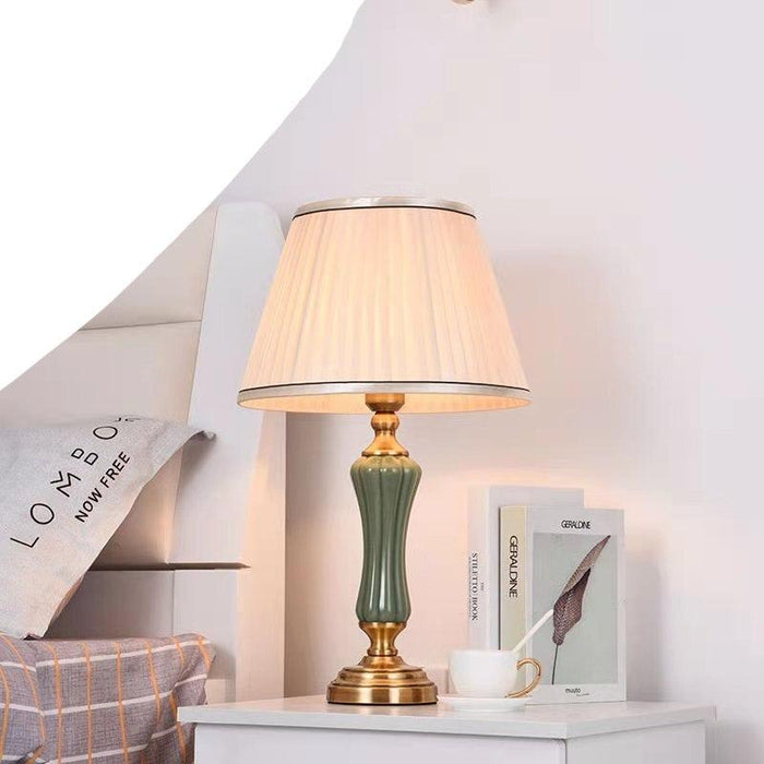 Sophisticated Metal Base Table Lamp with Fabric Shade for Elegant Home Lighting