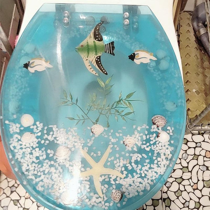 Ocean Design resin toilet seat with slow-close feature and noiseless operation for home and hotel use
