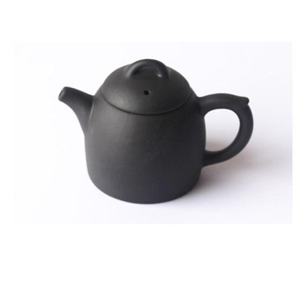 Whimsical Purple Clay Teapot Ensemble with Charming Tea Pet