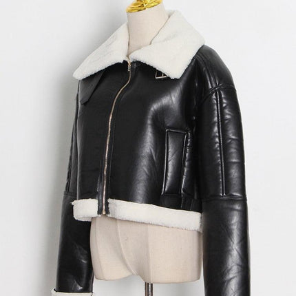 Sophisticated Color Block Jacket in Lambswool and Faux Leather: A Fusion of Elegance and Comfort