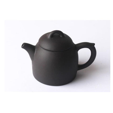 Whimsical Purple Clay Teapot Ensemble with Charming Tea Pet