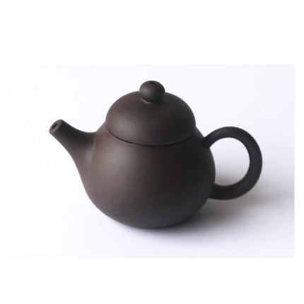 Whimsical Purple Clay Teapot Ensemble with Charming Tea Pet