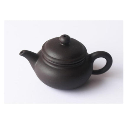 Whimsical Purple Clay Teapot Ensemble with Charming Tea Pet