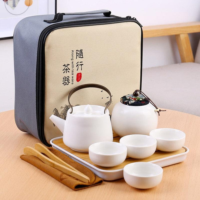 Elegant Ceramic and Metal Tea Ceremony Set with Artistic Tea Tray