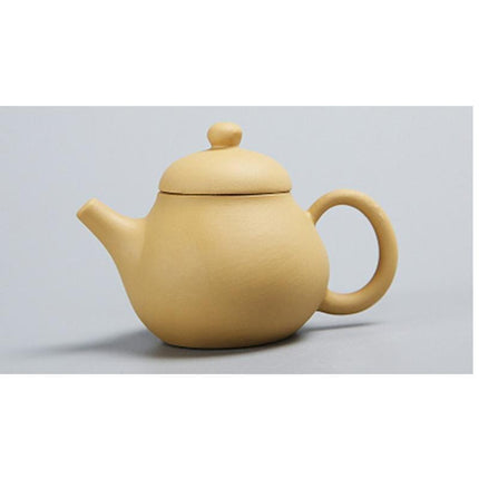 Whimsical Purple Clay Teapot Ensemble with Charming Tea Pet