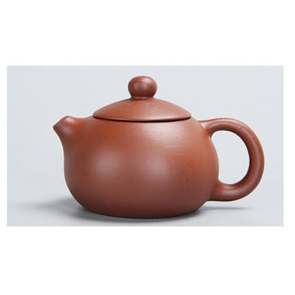 Whimsical Purple Clay Teapot Ensemble with Charming Tea Pet