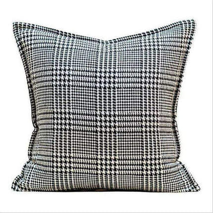 Elegant Black & White Grid Cushion Cover with Vibrant Orange Accent