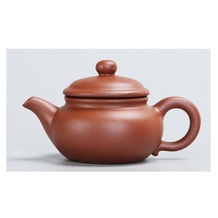 Whimsical Purple Clay Teapot Ensemble with Charming Tea Pet