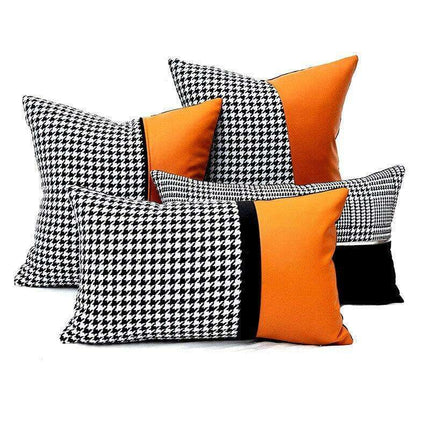 Elegant Black & White Grid Cushion Cover with Vibrant Orange Accent