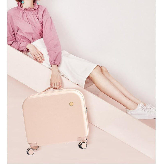 Sleek and Stylish Women's Premium Patent Spinner Carry-On for Modern Travelers