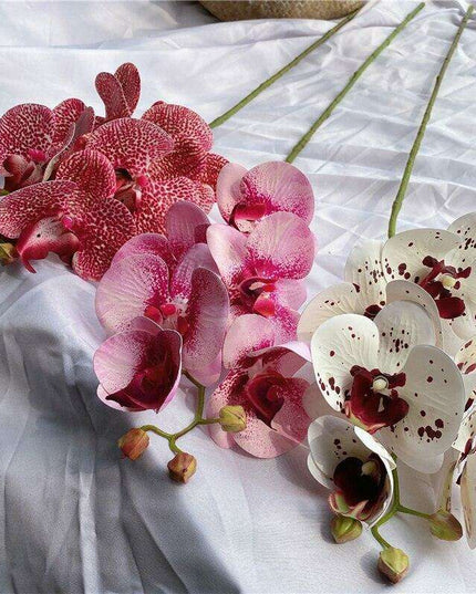 Sophisticated Elegance: Lifelike Faux Orchid Stem for Timeless Home Decor