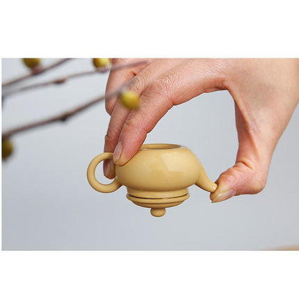 Whimsical Purple Clay Teapot Ensemble with Charming Tea Pet