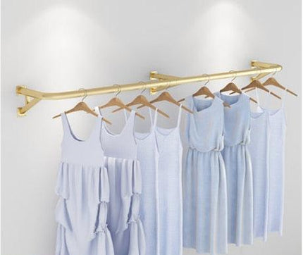 Elegant Wall-Mounted Clothing Rack for Stunning Women's Fashion Displays in Your Boutique