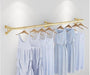 Maximize Your Boutique's Women's Fashion Showcase with a Sleek Wall-Mounted Garment Display
