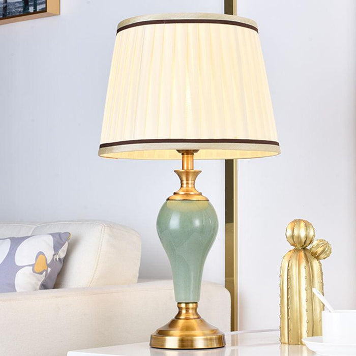 Sophisticated Metal Base Table Lamp with Fabric Shade for Elegant Home Lighting