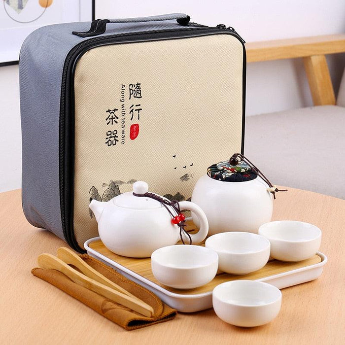 Elegant Ceramic and Metal Tea Ceremony Set with Artistic Tea Tray