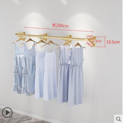 Elegant Wall-Mounted Clothing Rack for Stunning Women's Fashion Displays in Your Boutique