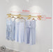 Elegant Wall-Mounted Clothing Rack for Stunning Women's Fashion Displays in Your Boutique