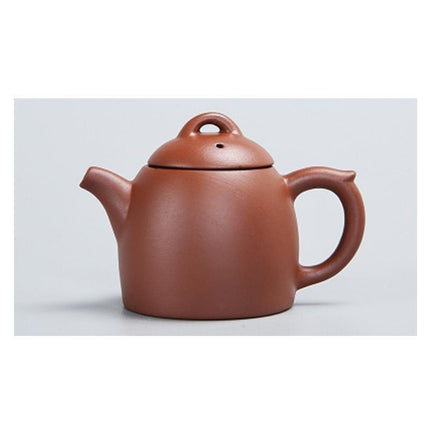 Whimsical Purple Clay Teapot Ensemble with Charming Tea Pet