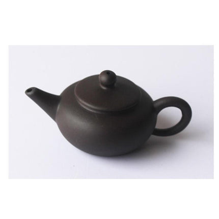 Whimsical Purple Clay Teapot Ensemble with Charming Tea Pet