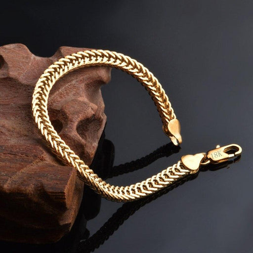 Dazzling 18k Gold Serpent Chain Bracelet with Polished Finish