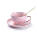 Elegant Porcelain Tea Set with Marbled Design and Gold Trim