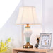 Sophisticated Metal Base Table Lamp with Fabric Shade for Elegant Home Lighting