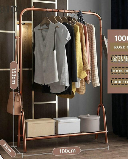 Elegant Rose-Gold Single-Pole Garment Stand and Storage Solution