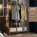 Elegant Rose-Gold Single-Pole Garment Stand and Storage Solution