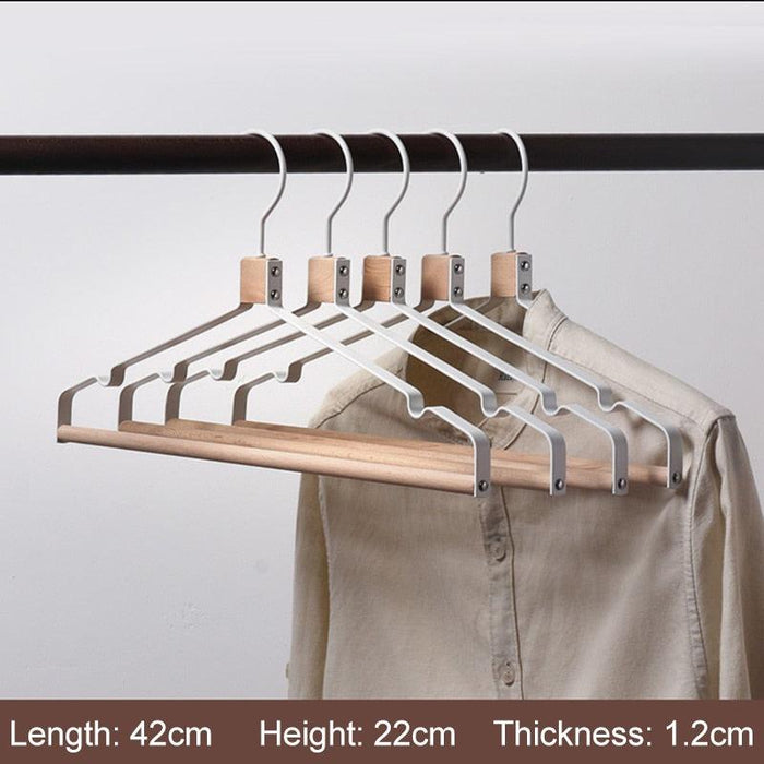 Elevate Your Wardrobe Organization with Elegant Metal and Wood Coat Hangers